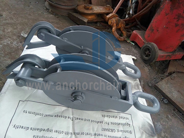 JIS F3419 بلوک های فولادی گای را با چرخاننده برای طناب فیبر ارسال می کند